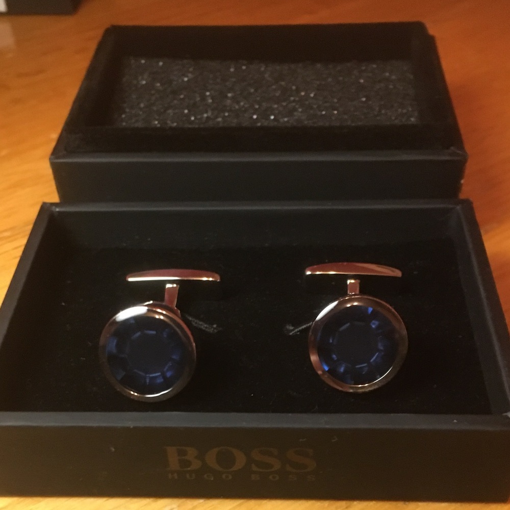 Hugo BOSS cuff links. Blue and silver. Never worn. Authentic. No flaws.
